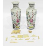 Pair of Oriental porcelain vases with tall flared necks, circular tapering form, floral decoration,