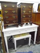 Pair of mahogany small chests of drawers of four drawers, raised on bracket feet, 37cm,