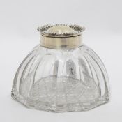 Early 20th century silver-mounted glass inkwell, gadrooned decorated lid to tapering glass base,