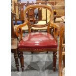 19th century mahogany-framed elbow chair having open scroll arms and on fluted supports with button