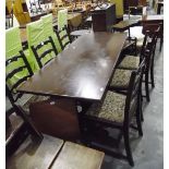 Reproduction oak refectory-style dining table and a set of six oak reproduction ladderback dining