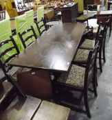 Reproduction oak refectory-style dining table and a set of six oak reproduction ladderback dining