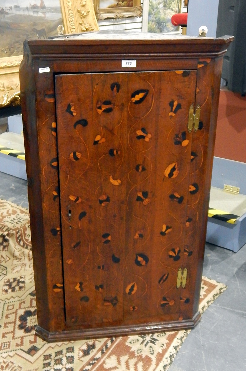 18th century mahogany and stylised floral inlaid hanging corner cupboard, with brass H-hinges,