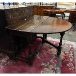 18th century oak fall-flap gateleg table on baluster turned supports,