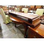 Georgian-style mahogany wind-out dining table with rounded ends and moulded edged top,