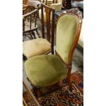 Lady's Victorian spindle-back nursing chair on carved cabriole supports and scroll toes