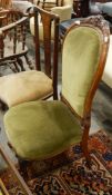 Lady's Victorian spindle-back nursing chair on carved cabriole supports and scroll toes