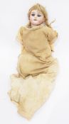 Bisque headed doll with open mouth and articulated composition body