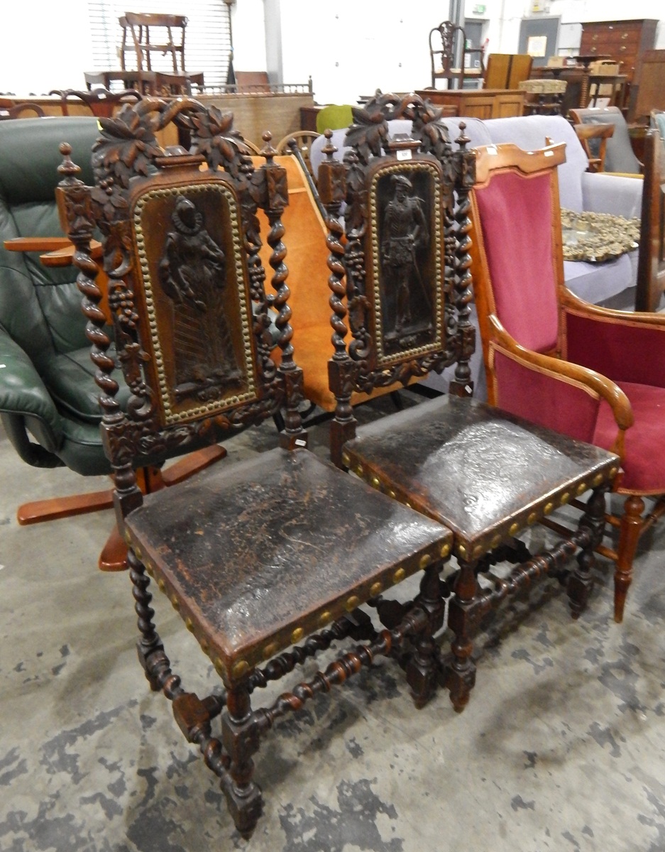 Pair of oak and studded leather dining chairs,