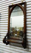 Victorian Gothic-revival carved oak framed wall mirror with lancet-shaped plate,