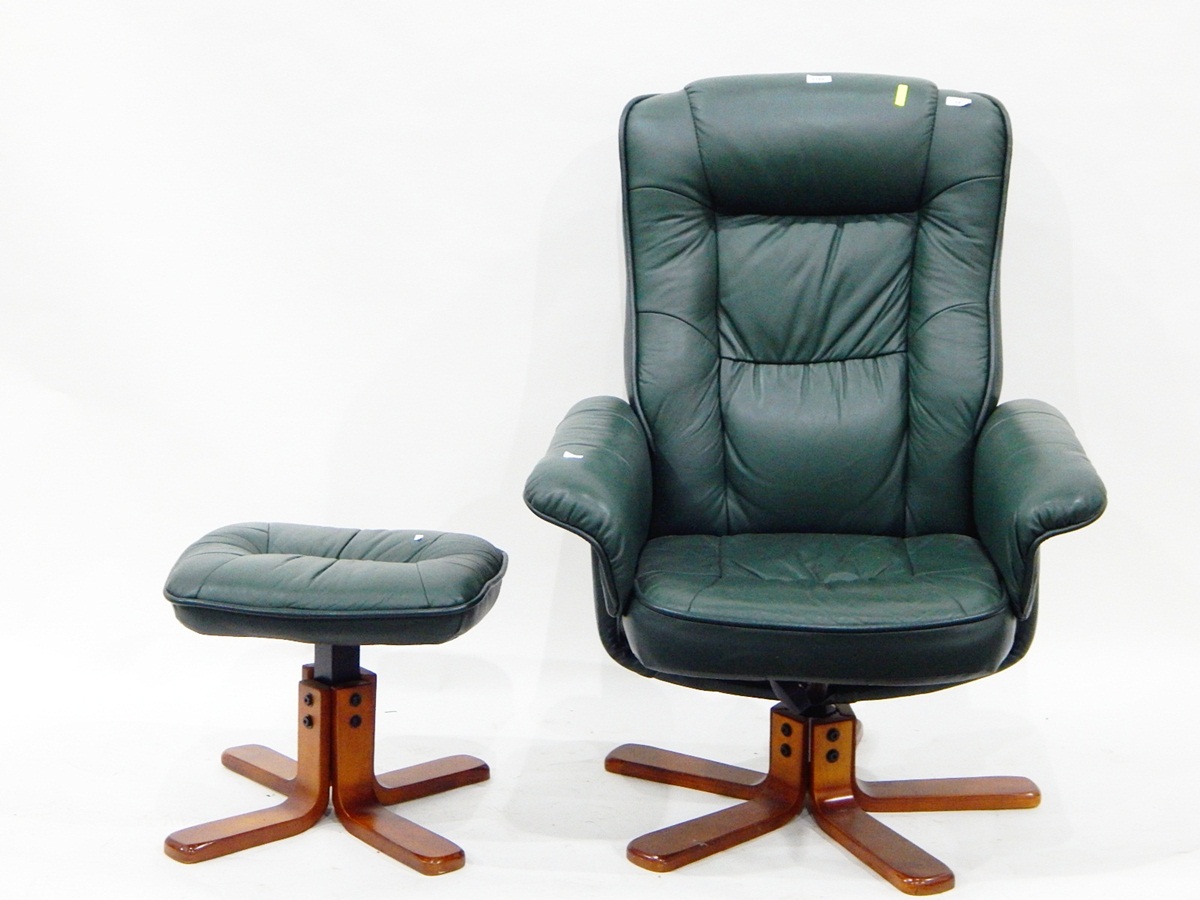 Global Furniture Alliance modern leather swivel recliner with matching footstool in dark green