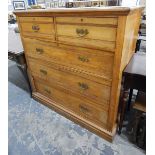 Edwardian satin walnut chest of two short and three long drawers, on plinth base,