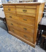 Edwardian satin walnut chest of two short and three long drawers, on plinth base,