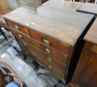 Early 19th century oak straight-front chest of two short and three graduated long drawers,