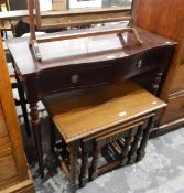 Mahogany serpentine-fronted side table fitted two small frieze drawers and on turned supports