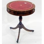 Small drum-top table with inset writing surface, frieze drawers,