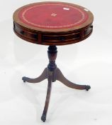 Small drum-top table with inset writing surface, frieze drawers,