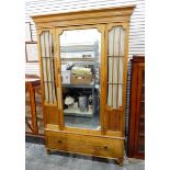 Early 20th century mahogany wardrobe with flat moulded cornice over a central mirror-panelled door,