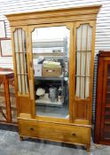 Early 20th century mahogany wardrobe with flat moulded cornice over a central mirror-panelled door,