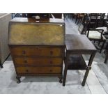 Mid 20th century mahogany veneered bureau having the usual pigeonhole interior over three drawers,