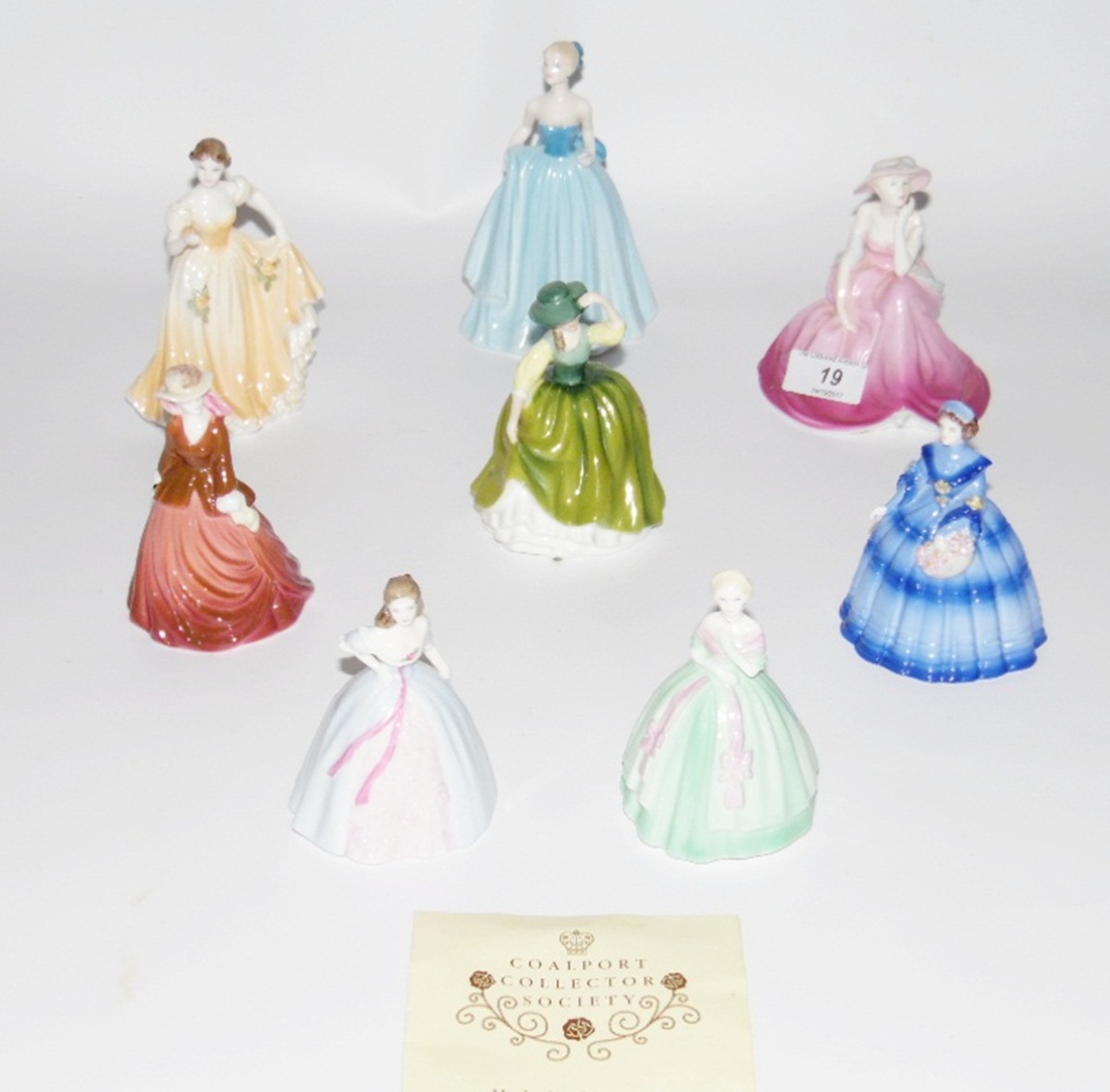 Seven Coalport figures including "In Love", four Minuettes "Leona", "Gemma",