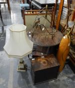 Small circular wooden side table, a wood-framed firescreen, two table lamps,