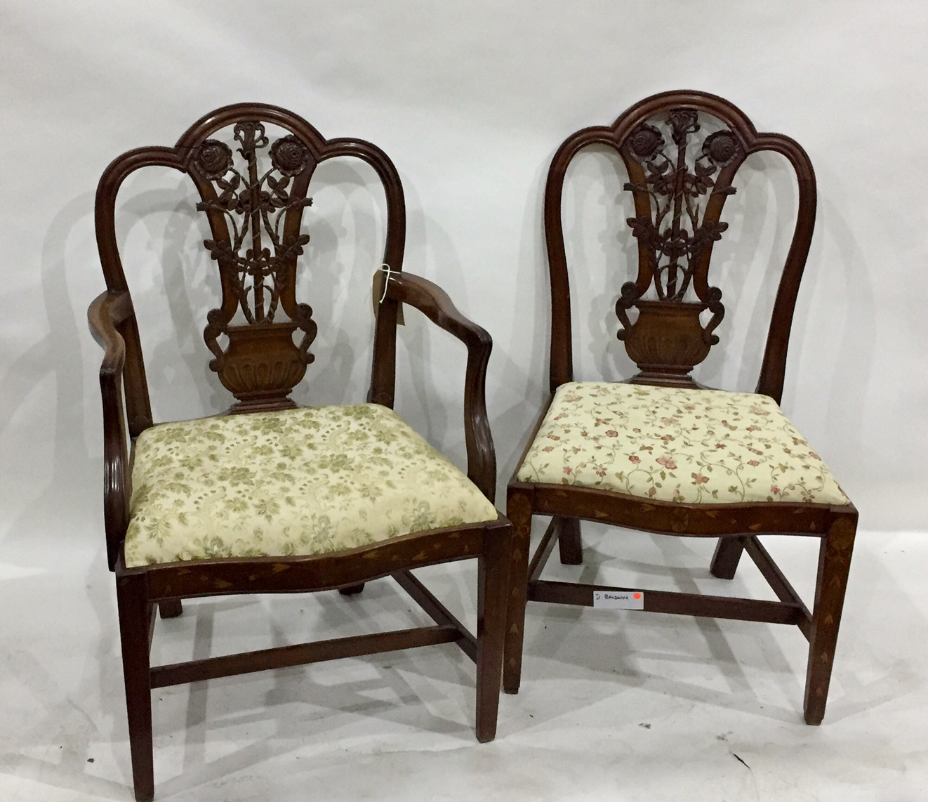 Set of seven 19th century marquetry inlaid mahogany dining chairs having shaped crest rails and