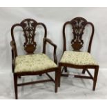 Set of seven 19th century marquetry inlaid mahogany dining chairs having shaped crest rails and