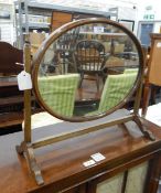 Mahogany framed oval swing-framed dressing table mirror