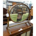 Mahogany framed oval swing-framed dressing table mirror