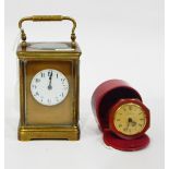 Brass carriage clock, the circular enamel dial with Arabic numerals,