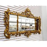 Carved giltwood overmantel wall mirror, rectangular and in three sections,