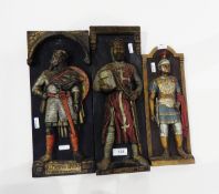 Three painted plaster wall plaques, one depicting 'Alfred the Great',