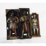 Three painted plaster wall plaques, one depicting 'Alfred the Great',