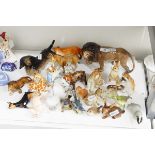 Melbaware model lion, 14cm high, a model dachshund (repaired), a Beswick model fox (repaired),