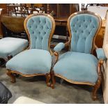 Pair of Victorian ladies and gentlemen's mahogany-framed spindle back, button upholstered chairs,