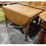 Mahogany drop-flap dining table with moulded border, frieze drawer,