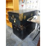 Large tin and brass-coloured metal travelling trunk and another (2)