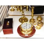 Modern ship's clock by Sewills of Liverpool, in brass case and mounted on wooden board,