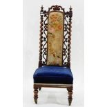 Victorian mahogany-framed nursing chair having carved and pierced crest-rail over spiral turned