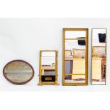 Oval mahogany-framed wall mirror,