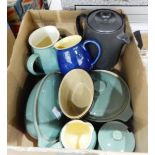 Two sage green Denby casserole dishes with two matching jugs and a sugar bowl and other Denby items