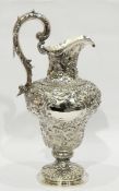 Victorian silver large jug, foliate embossed decoration, scroll handle,