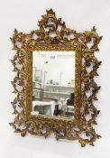 Gilt metal wall mirror,