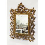 Gilt metal wall mirror,