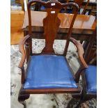 Pair of mahogany-framed elbow chairs with vase-shaped splats,