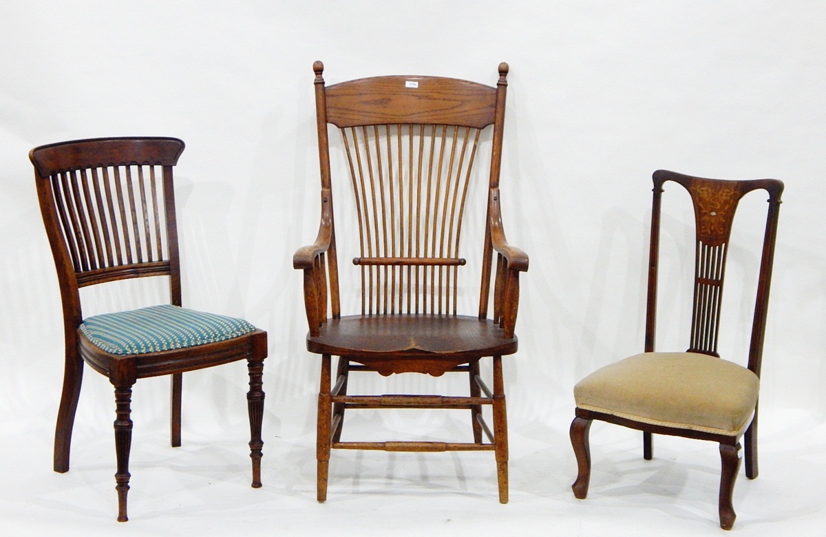 Edwardian period oak-framed spindle back elbow chair