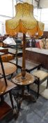 Mahogany lamp standard having turned and fluted column,