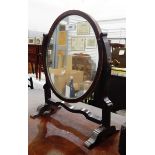 Small 19th century mahogany swing-framed vanity/toilet mirror and an Edwardian mahogany footstool