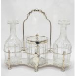 Victorian silver tantalus with two cut glass decanters and a silver-mounted ice bucket,